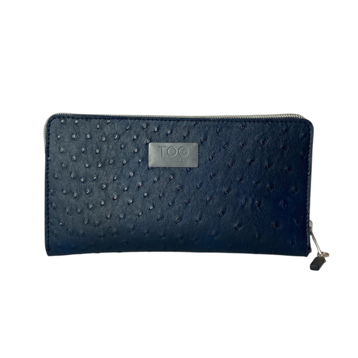 Portafoglio donna PVC e pelle vegan, con tasca interna con cerniera e scomparti per carte. Chiusura con zip, disponibile in due misure