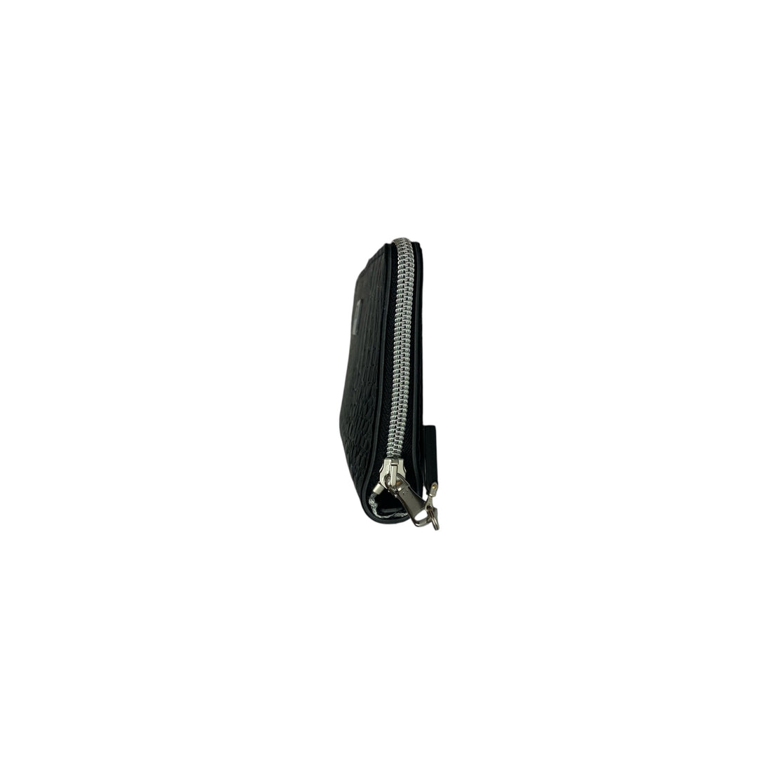 Portafoglio donna PVC e pelle vegan, con tasca interna con cerniera e scomparti per carte. Chiusura con zip, disponibile in due misure