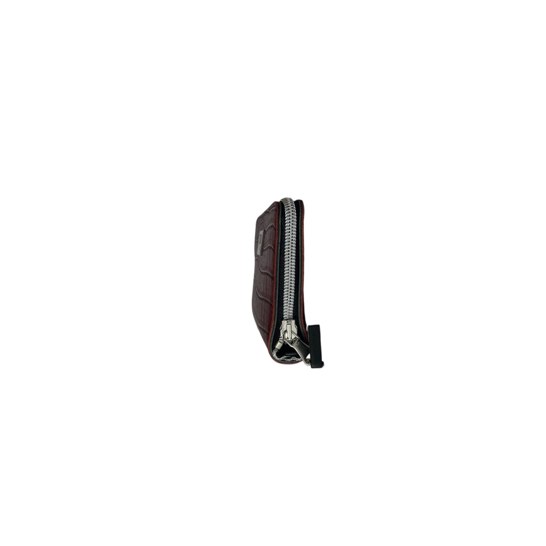 Portafoglio donna PVC e pelle vegan, con tasca interna con cerniera e scomparti per carte. Chiusura con zip, disponibile in due misure