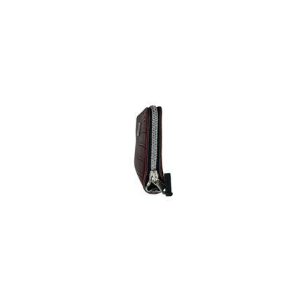 Portafoglio donna PVC e pelle vegan, con tasca interna con cerniera e scomparti per carte. Chiusura con zip, disponibile in due misure