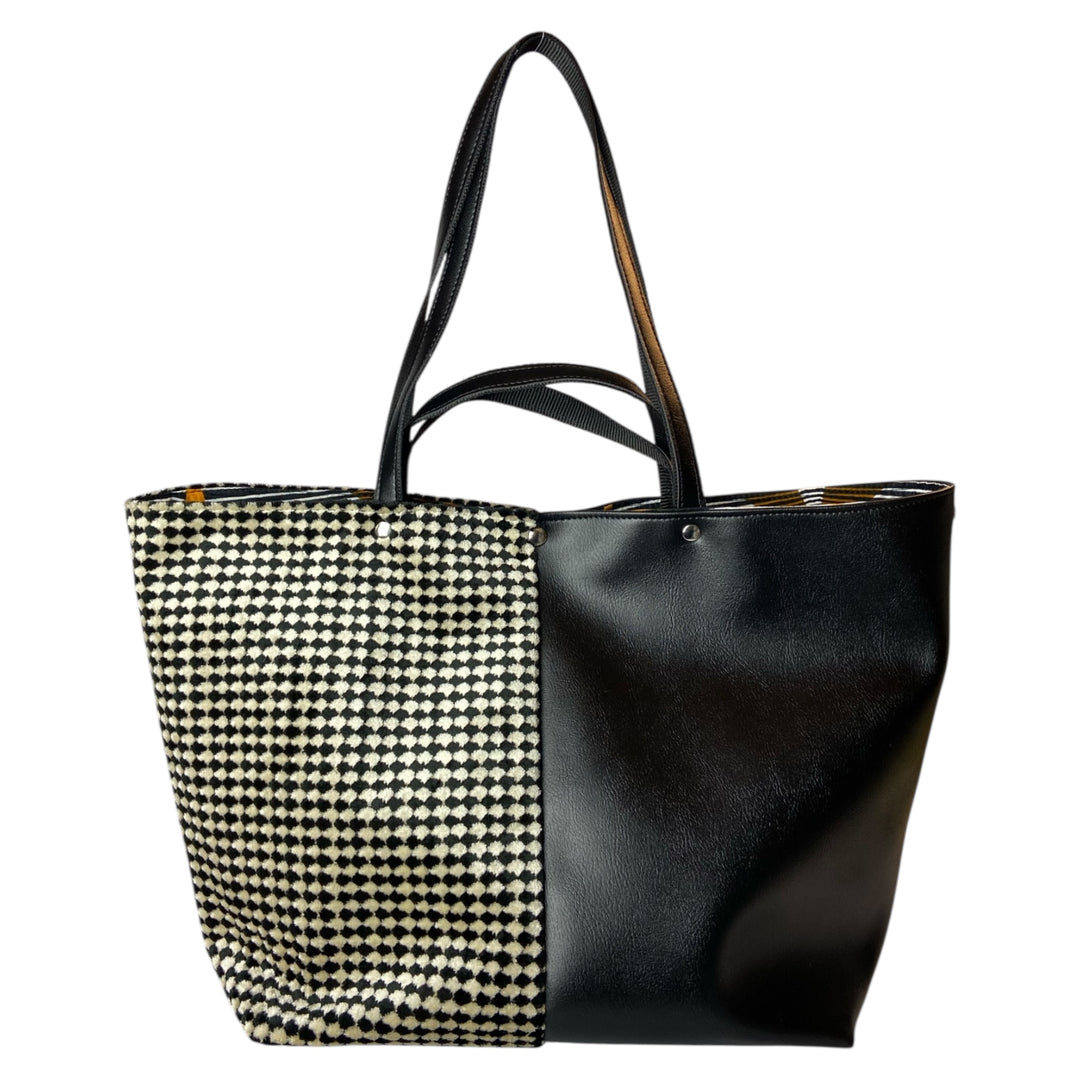 Tote, borsa a mano e a spalla ideale per chi cerca spazio, praticità e stile in un unico accessorio