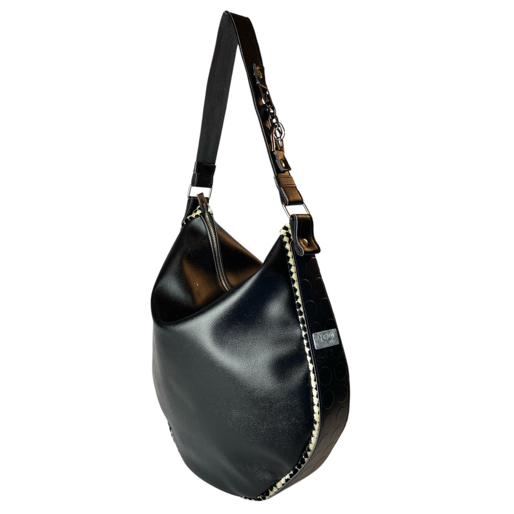 Hobo Trapezio, borsa a spalla capiente con un design morbido e avvolgente senza rinunciare alla funzionalità