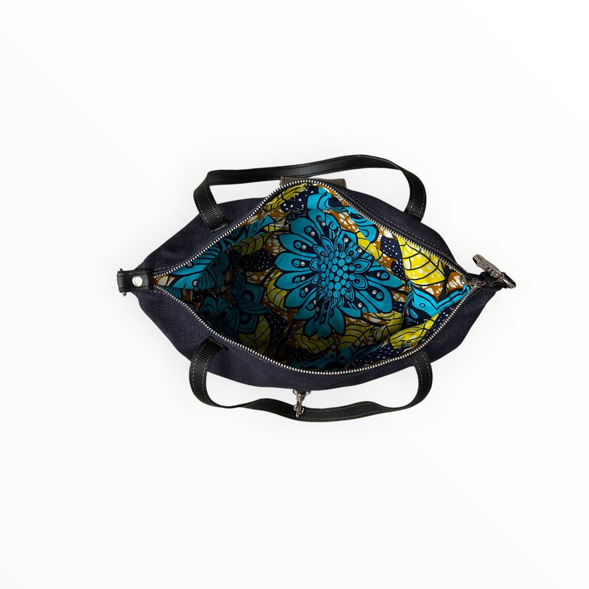 Interno del bauletto in jeans con fodera in fantasia african