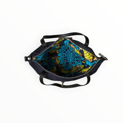 Interno del bauletto in jeans con fodera in fantasia african