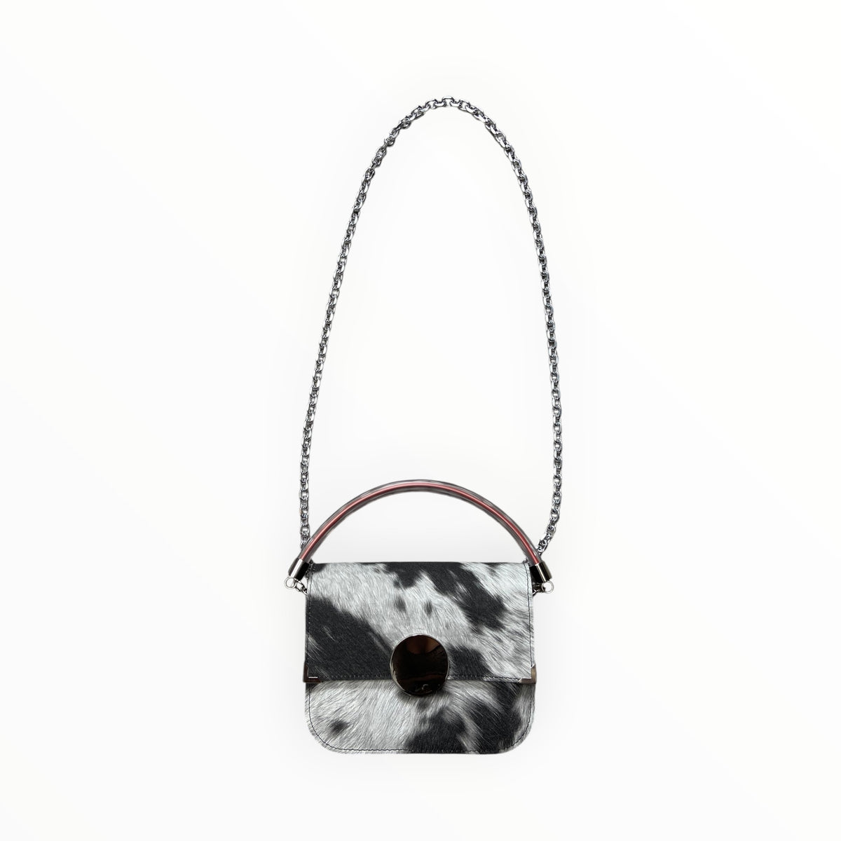 Borsa a tracolla Chicca XL TOOitaly effetto muccato in tessuto impermeabile serigrafato con catena in metallo e manico trasparente.
