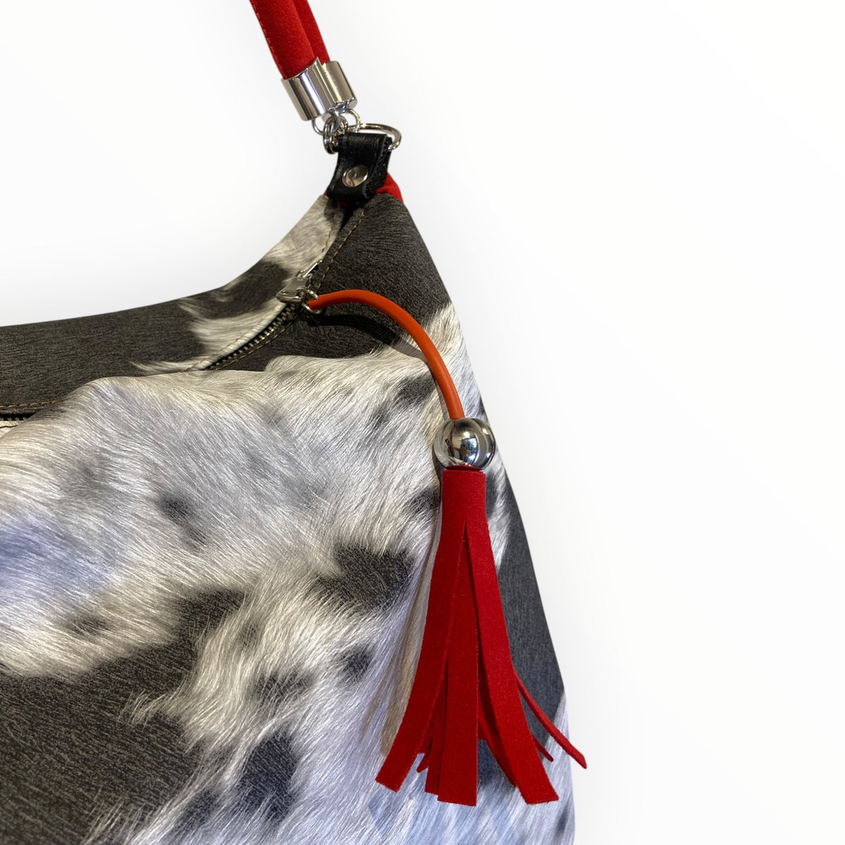 Nappina rossa in Alcantara con tiralampo della borsa Hobo effetto cavallino