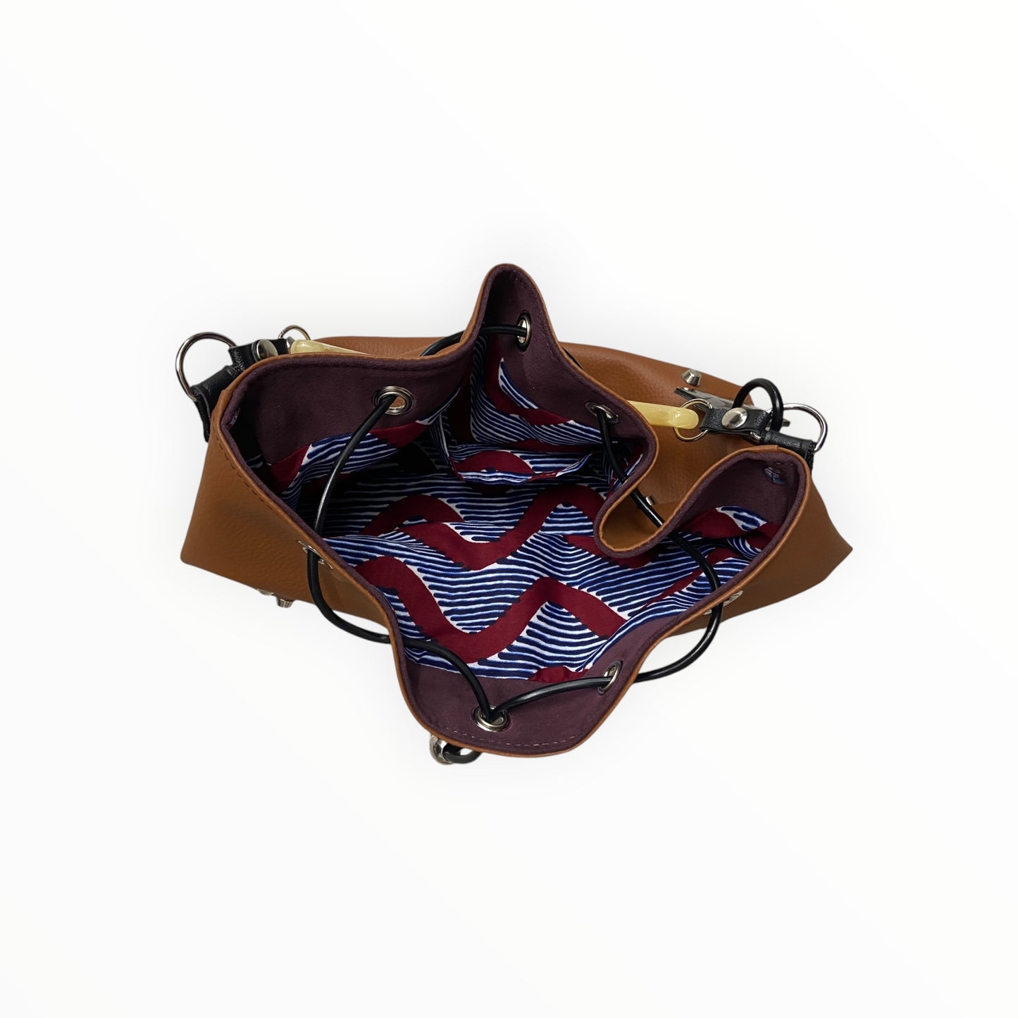 Borsa a secchiello donna in pelle artificiale cuoio con fodera in cotone africano
