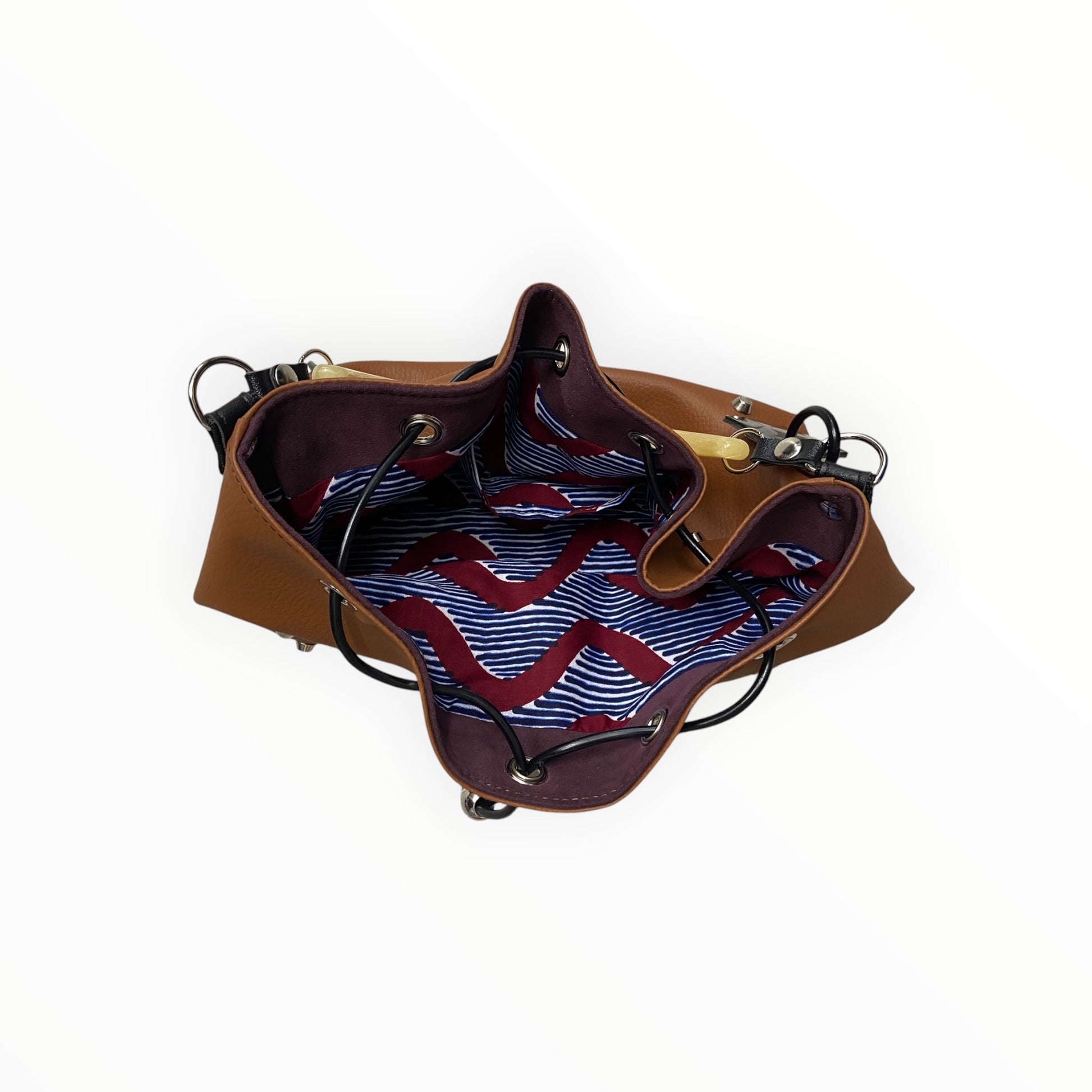Borsa a secchiello donna in pelle artificiale cuoio con fodera in cotone africano

