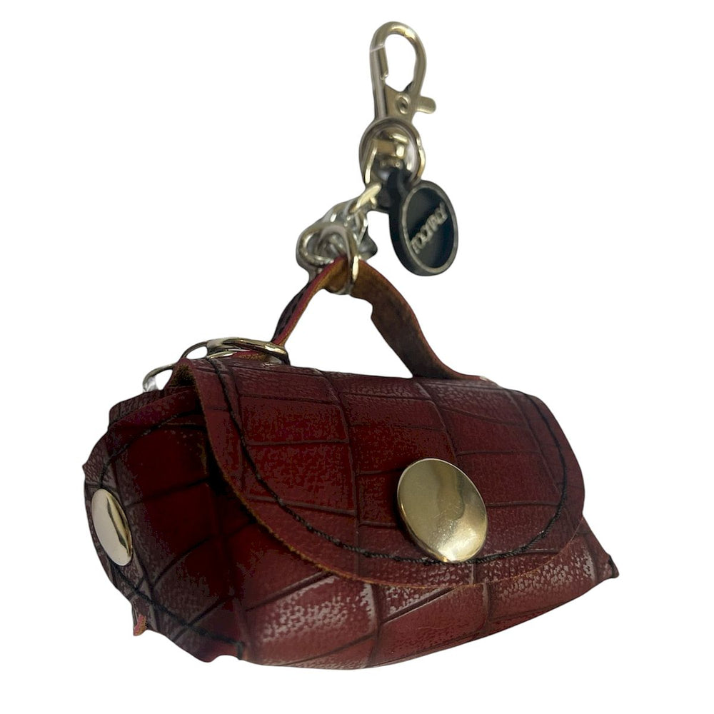 Micro borsa portachiavi TOOitaly, un accessorio artigianale realizzato con materiali vegan e cruelty-free. Perfetta come charms