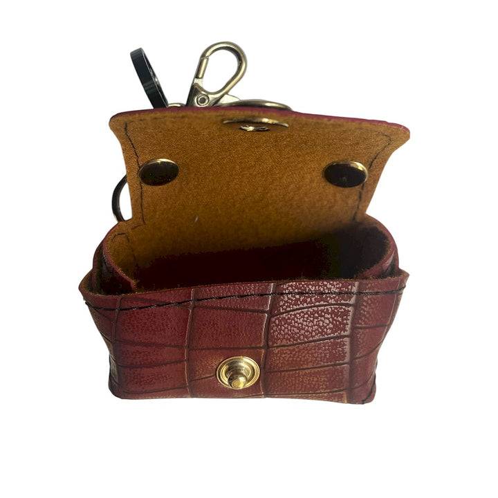 Micro borsa portachiavi TOOitaly, un accessorio artigianale realizzato con materiali vegan e cruelty-free. Perfetta come charms