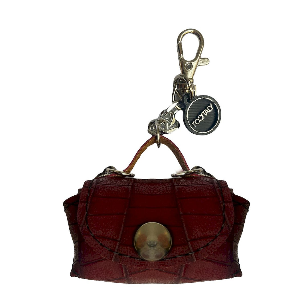 Micro borsa portachiavi TOOitaly, un accessorio artigianale realizzato con materiali vegan e cruelty-free. Perfetta come charms