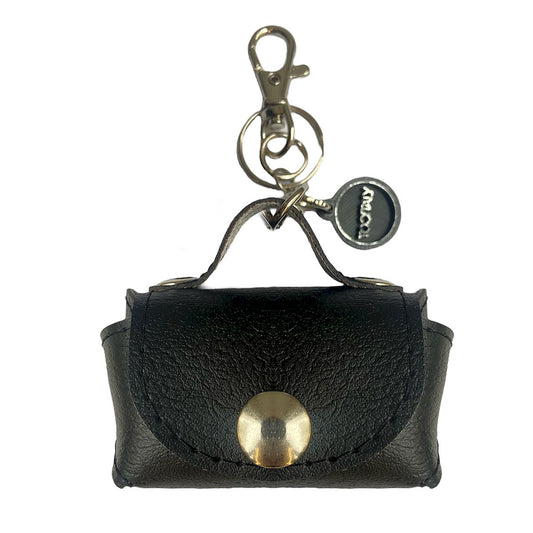 Micro borsa portachiavi TOOitaly, un accessorio artigianale realizzato con materiali vegan e cruelty-free. Perfetta come charms