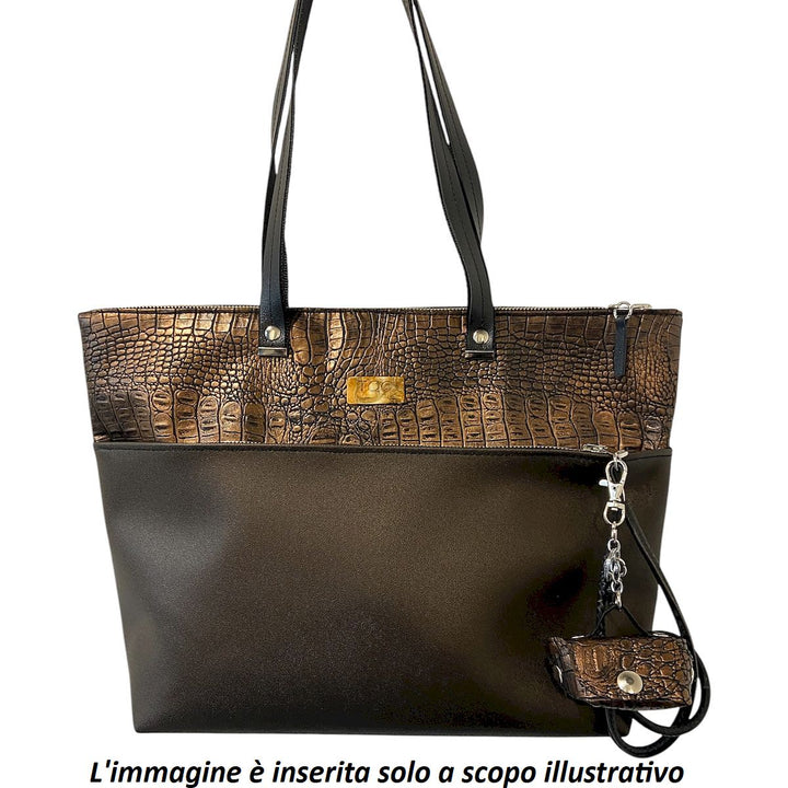 Micro borsa portachiavi TOOitaly, un accessorio artigianale realizzato con materiali vegan e cruelty-free. Perfetta come charms