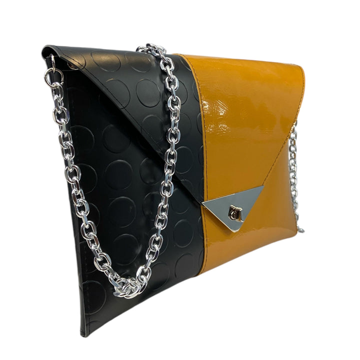 Borsa a mano e tracolla Clutch Maxi di TOOitaly, design compatto, struttura rigida in PVC rivestita in alcantara 100%
circolare o pelle ecologica