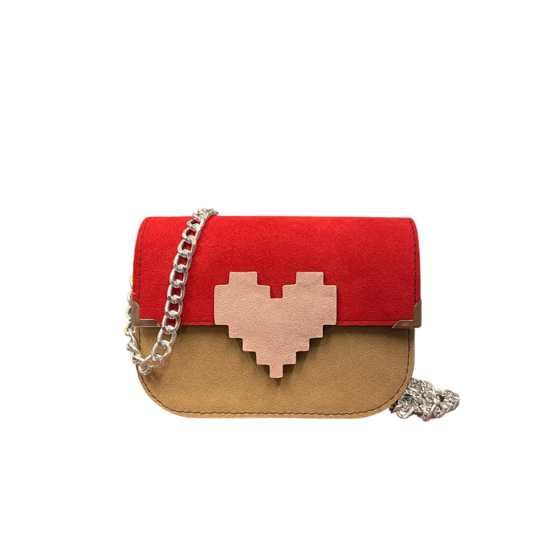 Chicca Mini Rosso Papavero, la borsa sostenibile compatta che esprime energia, identità e stile contemporaneo.